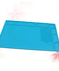 Top Notch Silicone Repair Mat With Heat Resistant Non Slip Surface And Precision Pin Layout For Soldering Stations Laminating Machines And No Sweat Tech Fixes, blue silicone mat with tool sections.