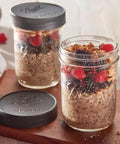 Awesome Leak Proof Plastic Lids for Wide Mouth Mason Jars filled with oatmeal and berries, BPA Free Made In USA