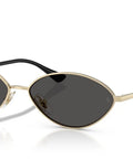 Kai Oval Sunglasses 56mm Pale Gold Frame With Dark Grey Lenses, Eco Conscious Retro Style, Adjustable Nose Pads, Side View