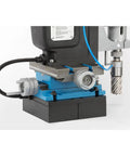 Close-up of Rock Solid Workhorse Portable Magnetic Mill Drill With Adjustable Base Variable Speed Four Gear Drive Reversible Motor.