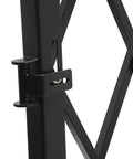 Close-up of Built Like A Tank Foldable Security Gate locking mechanism, showcasing iron construction and design details.