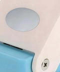 Close-up of Portable Oval Tab Punch For Scrapbooking And Card Making, showing steel cutting edge and easy grip handle.