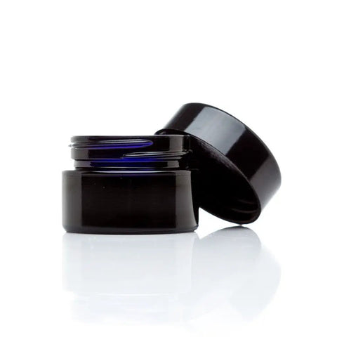 Sleek Black Glass Storage Jar With Airtight Seal Keeps Your Goodies Fresh And Secure Ideal For Travel Tins Pantry Stash And Everyday Clutter Control. Small 15 ml jar with lid.
