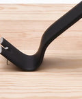 Fifteen Inch Flat Utility Pry Bar With Nail Puller And Chisel Ends for prying and lifting on wood surface, carbon steel, rust-resistant.