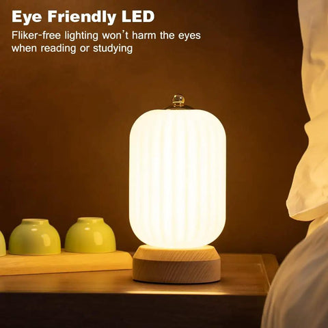 Cozy Small Table Lamp For Bedroom And Nightstand, Kid Friendly Minimalist Solid Wood Lamp glowing on nightstand