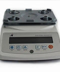 Knockout Precision Digital Density Meter That Slacks On Setup But Delivers Heavy Duty Gravimeter Results For Rubber Solid Granules And Thin Films With Zero Sweat Auto Calibration, front view with control panel.