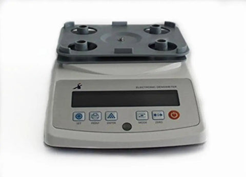 Knockout Precision Digital Density Meter That Slacks On Setup But Delivers Heavy Duty Gravimeter Results For Rubber Solid Granules And Thin Films With Zero Sweat Auto Calibration, front view with control panel.