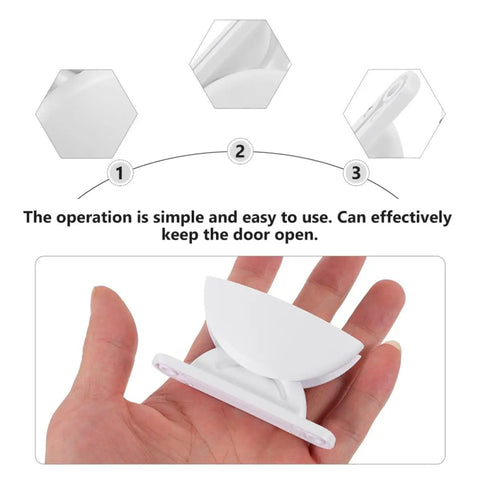 Premium 2 Pack White Rv Door Stop Retainer Tool For Motorhomes And Travel Trailers Holds Entrance Doors Securely In Place Prevents Slams While Camping Or Driving On The Road held in hand, showing easy operation.
