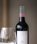 100 Piece Clear PVC Heat Shrink Wine Bottle Caps Add A Top Shelf Vibe To Your Glass Bottles used on Shiraz wine bottle neck.