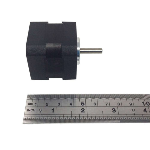 Side view of 42mm Diameter BLDC 24V 5000RPM Brushless 3 Phase Small DC Motor for DIY Builds with 5mm Shaft next to a ruler.
