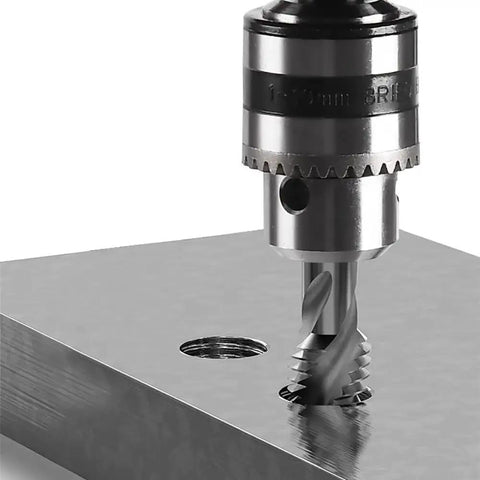 Close-up of 100-240V Desktop Vertical Electric Tapping Machine Drill Tapper in action on metal with 1-10 mm B12 chuck.