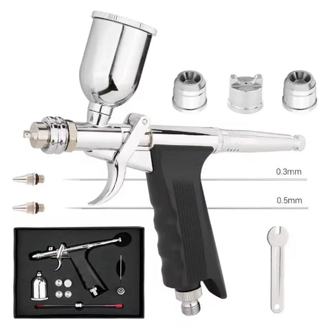 Heavy Duty Gravity Feed Dual Action Pistol Grip Airbrush With Adjustable Flow Control And Killer Fine Detail Spray Gun showing 0.3mm nozzle and accessories.