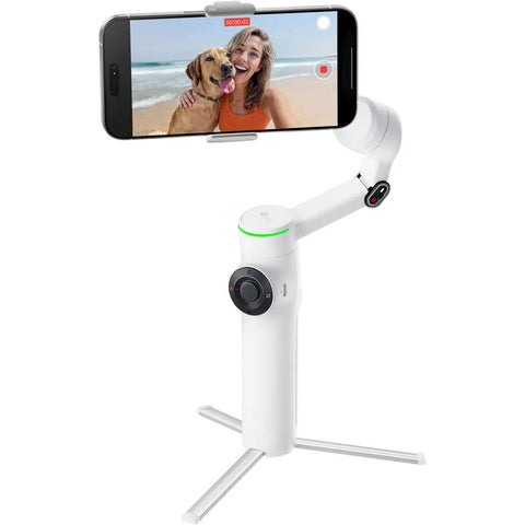 Flow 2 Pro Smartphone Gimbal With 3 Axis Stabilization And AI Tracking showing smartphone on beach setting, white tripod view