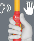 Hand holding 7516 VDE Kraftform Safe Torque Speed Torque Screwdriver with tactile and auditory feedback symbols.