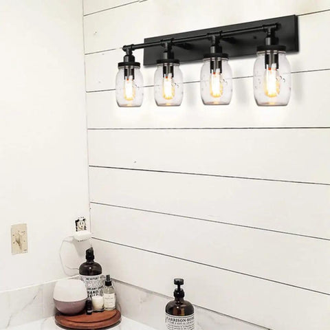 Industrial Black Vintage Bathroom Vanity Light Fixtures With Glass Mason Jar Shades 4 Light Wall Sconces installed on shiplap wall in modern farmhouse bath.