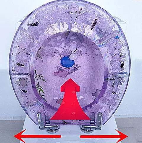 Vibrant Purple Round Resin Toilet Seat With Embedded Sea Shells, Hella Smooth Slow Close Metal Hinge, Tough Four Hundred Pound Capacity, Dope Color Locked Finish For Effortless Bathroom Refresh from the front with decorative motifs.