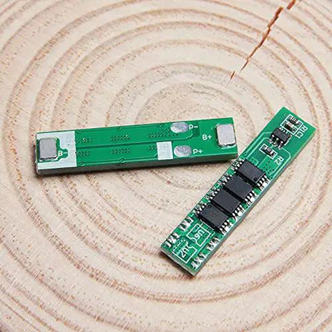 Solid 5 Pack 1S 3.7V 10A Lithium Ion BMS Protection Boards, Sweet 4.2V Charging Circuit With DW01 8205A Chips on wood background.