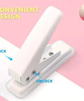 Heavy Duty Single Hole Puncher With One Quarter Inch Hole Twenty Sheet Capacity Metal Construction Skid Resistant Base Works On Paper Cardstock Chipboard And Arts Projects Easy Press Mechanism Clean Paper Scrap Removal, white puncher on pink background