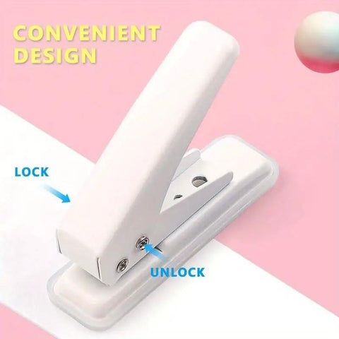 Heavy Duty Single Hole Puncher With One Quarter Inch Hole Twenty Sheet Capacity Metal Construction Skid Resistant Base Works On Paper Cardstock Chipboard And Arts Projects Easy Press Mechanism Clean Paper Scrap Removal, white puncher on pink background