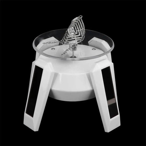 Solar Powered Jewelry Display Stand With 360 Degree Rotating Turntable And Blue LED Lights Electric Base for showcasing a necklace.