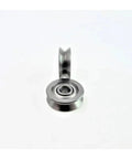Heavy Duty V Groove Roller Bearing Wheels Tough As Nails Carbon Steel Track Rollers For Sliding Patio Doors And Garden Gates 4X13X6MM V624ZZ Precision Ball Casters Pro Grade DIY Hardware Bulk Pack, showing a single roller with inner bearing.