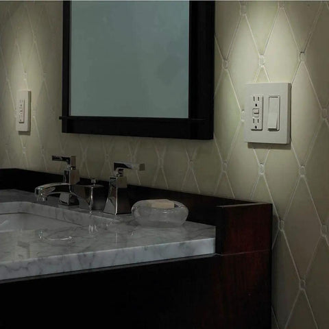 Claro On Off Light Switch 15 Amp Single Pole Black CA-1PS-BL installed in a bathroom setting on textured wall near vanity.