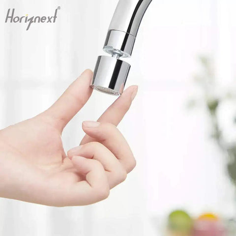 Person touching chrome Kitchen Faucet Aerator With 360 Degree Swivel Sprayer Attachment Dual Flow No Splash