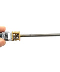 Top Grade N20 And M4 DC Gear Motor With 55mm Threaded Shaft shown in hand, ideal for DIY robot frames and garage modifications.