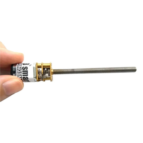 Top Grade N20 And M4 DC Gear Motor With 55mm Threaded Shaft shown in hand, ideal for DIY robot frames and garage modifications.