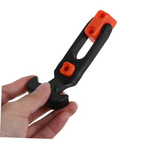Hand holding a black and orange component of Beefy Heavy Duty Hood Latches Kit for Cars With T Handle Rubber Shock Absorption and Tool Box Latch Lock Down System That Keeps Your Engine Hood From Flying Open