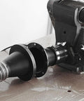 Installed view of MAG-SET13 magnetic dust collection adapter with 4-inch connector on woodworking machine
