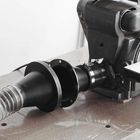 Installed view of MAG-SET13 magnetic dust collection adapter with 4-inch connector on woodworking machine