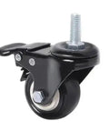 Close-up of a 2.5 inch black furniture caster with locking brake and dual wheel design, part of Grab Four Of These Badass Black Furniture Casters 2.5 Inch Universal Swiveling Rollers Built In Brake Solid Double Bearing Sleeve Smooth Operator Glide On Wood Or Tile Floors Daily.