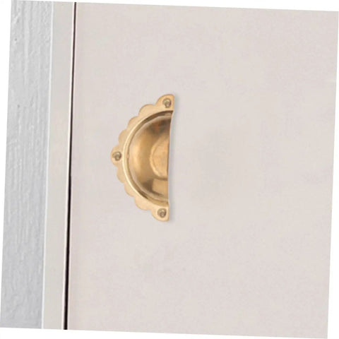 Vintage Gold Semi Circle Cabinet Door Pulls 2 Pack on white cupboard, durable metal hardware, retro style.
