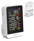 5 In 1 Indoor Air Quality Monitor Real Time CO2 TVOC HCHO Temperature Humidity With Digital Display And Alerts Easy Setup For Home Office Use Tracks Air Quality Metrics And Helps You Keep Your Family Safe And Air Fresh. White plastic desk air quality monitor front view with color display