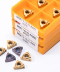 MMT 11ER AG60 US735 VP15F carbide inserts in orange storage case; front view.