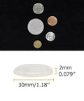 Slick Silicone Adhesive Furniture Pads For Glass Tables And Cabinet Drawers Featuring Dead Quiet Anti Slip Grip showing size with coins for scale.