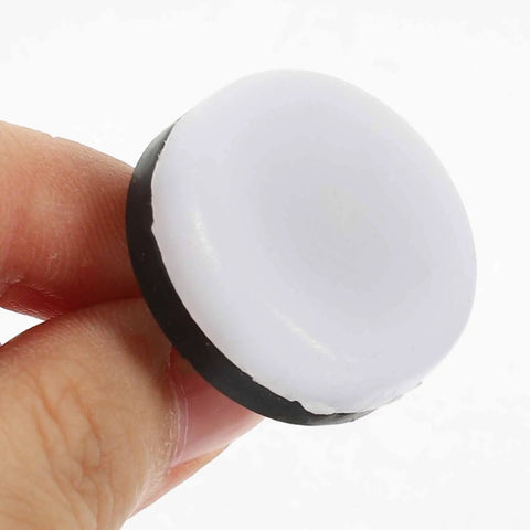 Close-up of a white nylon head from the 40 Piece Brown Round No Slip Floor Protectors For Chair And Table Legs Noise Proof Glides.