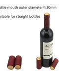 Premium Heat Shrink Wine Bottling Caps 100 Pack Matte Oriental Red on wine bottle with gold top for effective sealing.