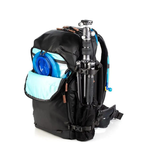 Side view of Explore V2 30 Starter Kit Camera Backpack For Travel And Outdoor Adventures, showing medium mirrorless core unit.
