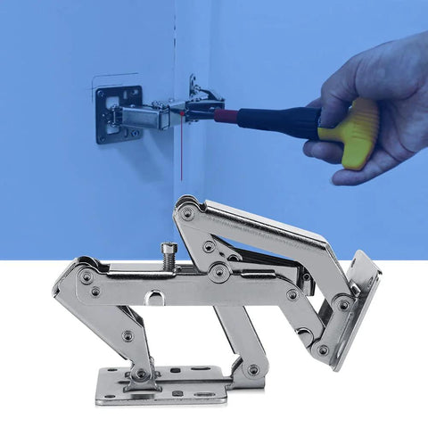 Pair of stainless steel frameless cabinet hinges with soft-close dampers, being installed with screwdriver