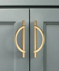 Brushed Gold Cabinet Pulls 5 Inch 128mm Hole Centers 10 Pack handles on kitchen cabinet demonstrating modern style and durability.