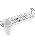 Expandable Over The Sink Drying Rack Caddy With Kitchen Towel Bar Holder And Soaking Cup The Go To Kitchen Organizer For Cups And Utensils Fits 14.6 To 17.6 Inch Sinks Rust Resistant Stainless Steel White showing full view of stainless steel rack with white cup accessory.
