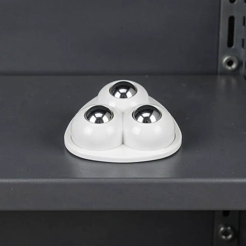 Furniture Caster Wheels Self Adhesive Swivel 12pcs for Cabinets, showing three shiny spheres on a white base for easy movement.