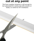 Scissors cutting White Weather Seal Tape, Badass High Density Foam, Self Stick Adhesive Backing, 1/2 Inch By 1/2 Inch By 16 5 Ft Roll.