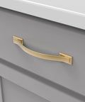 Solid Core Cabinet Pulls 10 Pack In Brushed Golden Brass Finish Dover Collection installed on gray cabinet drawer
