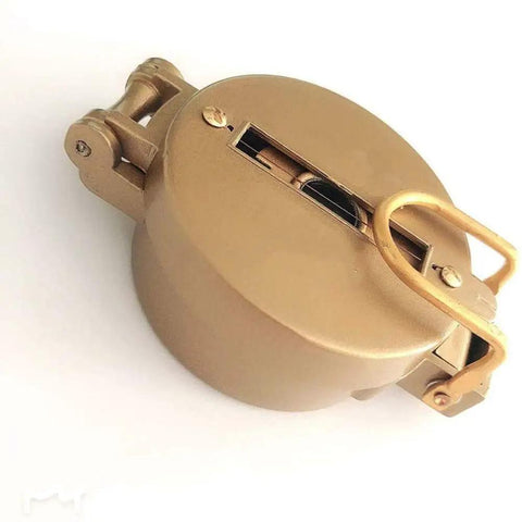 Golden Spiral Portable Compass For Outdoor Navigation And Survival, folded metal shell, top view showing durable construction.