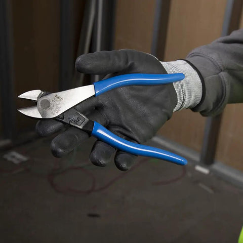 Worker holding 8 Inch Diagonal Pliers With Angled Head And High Leverage For Confined Spaces Cut ACSR Screws Nails And Hardened Wire Made In USA