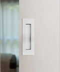 Recessed Sliding Door Handles Set 4 Pack Stainless Steel Invisible Cabinet Pulls, installed on white door panel.