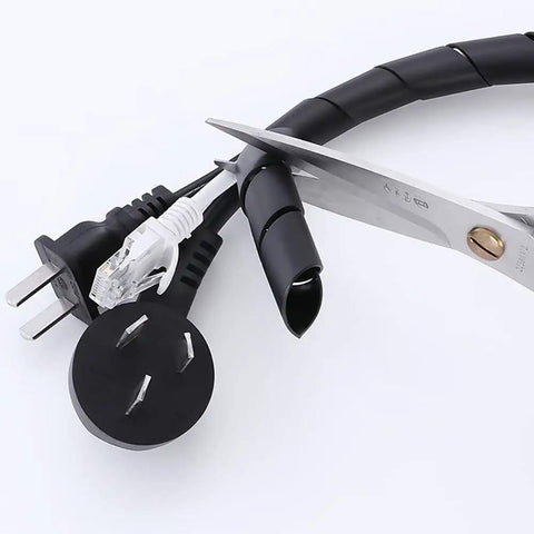 Spiral Cable Wrap 20 Ft 1/2 Inch Flexible Cable Sleeve for computer cables, power cords, and AV cables being cut with scissors, white PE material
